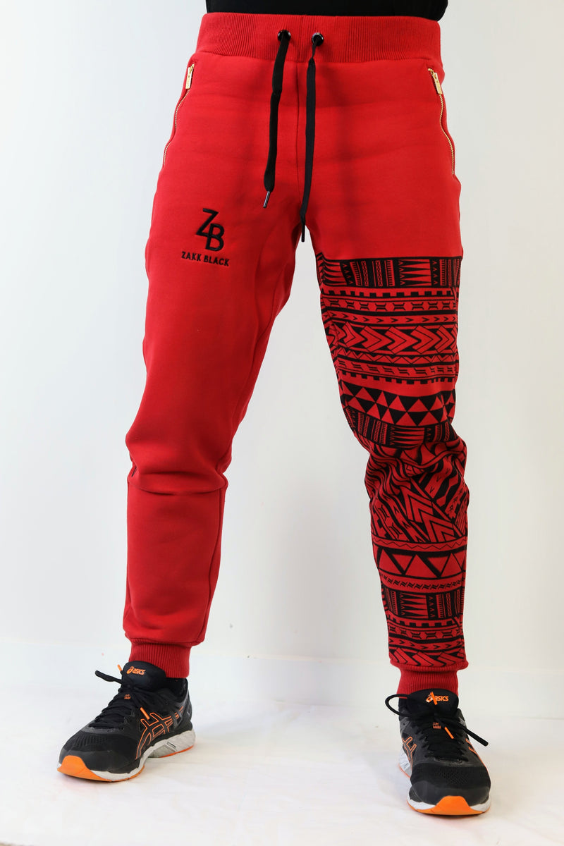 Red top black joggers
